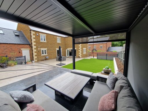 Seating area under a pergola with a view of the garden