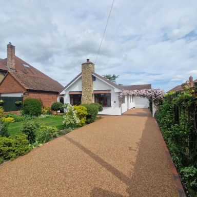 A golden resin bound aggregate driveway